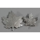 Two Graduated Silver Maple Leaf Brooches