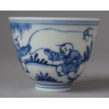 A Blue and White Porcelain Chinese Teacup with Six Character Mark to Base Decorated with Children at