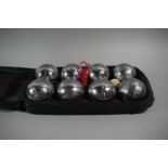 A Set of French Boules in Canvas Bag