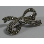 A Silver and Marcasite Brooch in the Form of a Bow