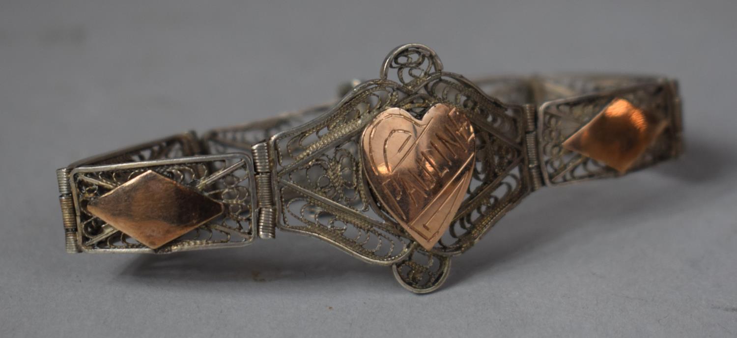 A Gold and Filigree Silver Bracelet with Heart Engraved "Pauline"