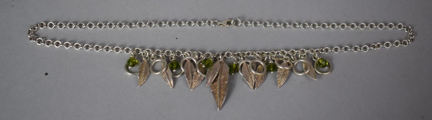 A Silver Necklace with Feather and Green Bead Decoration - Image 3 of 3