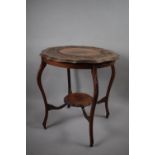 An Edwardian Shaped Circular Topped Occasional Table with Carved Border and Small Stretcher Shelf,