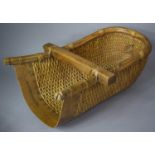 An Oriental Wooden and Wicker Trug, 62cm Long
