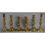 Three Pairs of Victorian Brass Graduated Candlesticks, The Tallest 21cm