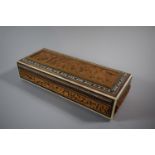 A Carved African Inlaid Wooden Box Depicting Lions Hunting Elephant, 28.5cm Wide