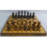 A Poker Work Folding Chess/Backgammon Board Together with a Mixed Set of Weighted Chess Pieces