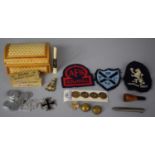 A Small Wicker Box Containing Cloth Badges, Esso Football Tokens, Replica German Iron Cross,