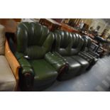 A Leather Effect Three Piece Suite with Reclining Armchairs