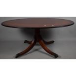 A Modern Crossbaned Oval Mahogany Coffee Table, 121cm Wide