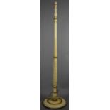 A Cream and Gilt Standard Lamp with Reeded Support