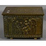 A Beaten Brass Slipper Box with Tavern Scene Decoration, 45.5cm Wide