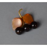 A Yellow Metal and Amber Brooch in the form of Cherries, Stamped in Russian