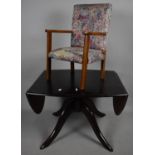 A Child's Armchair and a Drop Leaf Mahogany Coffee Table