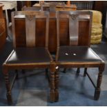 An Oak Drop Leaf Gate Leg Table with Three Dining Chairs