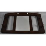 A Wooden Wall Hanging Mirror with Four Coat Hooks, 50cm wide