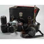 A Yashica 230/AF 33mm Camera, Praktica MTL50 and Various Lenses in Bag