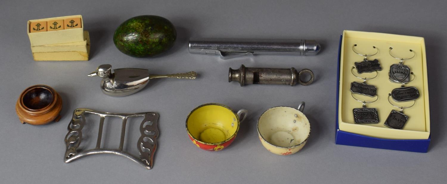 A Collection of Curios to Include Whistle, Belt Buckle, Novelty Salt etc