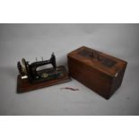 A Vintage Cased Manual Sewing Machine by Naumann, Germany