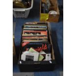 A Collection of 33rpm and 45rpm Records to Include Elvis, Val Doonican, Whitney Houston, Walker