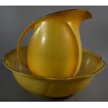 An Edwardian Yellow Glazed Toilet Jug and Bowl Set, Jug 29cm high