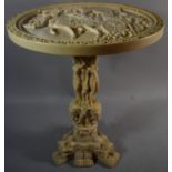 A Reproduction Resin Oriental Circular Table with Moulded Support and Relief Decoration to Top, 43cm