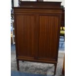 An Edwardian Sting Inlaid Mahogany Shelved Music Cabinet with Galleried Top Square Tapering Legs