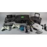 A Collection of Vintage Nintendo and Xbox Game Consoles and Controllers, not tested