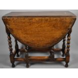 An Oak Barley Twist Drop Leaf Gate Legged Dining Table, 91cm Wide