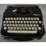 A Vintage Cased Olympia Splendid Manual Typewriter