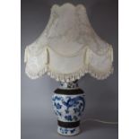 A Large Chinese Nanking Blue and White Vase Decorated with Dragons and Flaming Pearl Now Converted