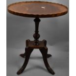 A Reproduction Mahogany Galleried Oval Wine Table on Four Scrolled Supports, 50cm Wide