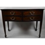 A Reproduction Mahogany Serpentine Front Four Drawer Chest on Tapering Square Legs with Spade