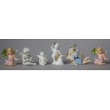 A Collection of Six Ceramic Fairy Ornaments