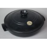 An Emile Henry Lidded Cooking Pot, 15cm Diameter