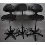 A Pair of Modern Swivel Adjustable Office Chairs and One Other