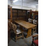 A Mid 20th Century Oak Dining Room Suite Comprising Refectory Style Table and Four Ladder Back