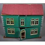 A Mid 20th Century Plywood Dolls House with Some Furniture, 79cm Wide