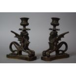 A Pair of French Bronze Candlesticks in the Second Empire Style, the Supports in the Form of