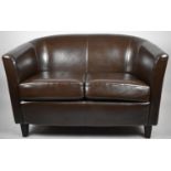 A Leather Effect Tub Two Seater Settee
