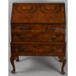 A Burr Walnut Crossbanded Fall Front Bureau with Fitted Interior and Three Long Drawers to Base,