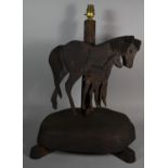 A Novelty Carved Wooden Table Lamp in the Form of Mare and Foal, 52cm high