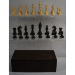 An Edwardian Wooden Box Containing Wooden Chess Set, The Kings 5.5cm High