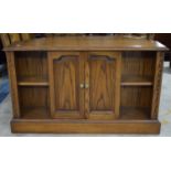 A Jaycee Oak TV Stand with Centre Cupboard and Shelved Area Either Side, 106cm wide