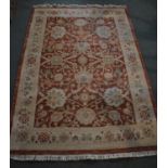 A Chinese Woollen Pattern Rug, 1.35x1.22m Retailed by GH Frith Ltd