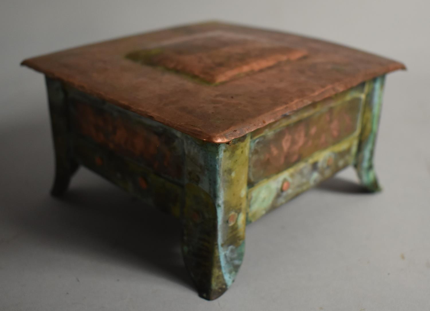 An Arts and Crafts Style Copper and Brass Lidded Box, 13x14cm