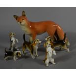 A John Beswick Model of a Fox and Six Continental Hound Ornaments
