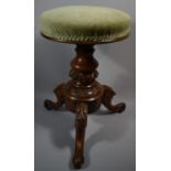 A Late Victorian Walnut Swivel Adjusting Piano Stool on Tripod Scrolled Feet, 31cm Diameter