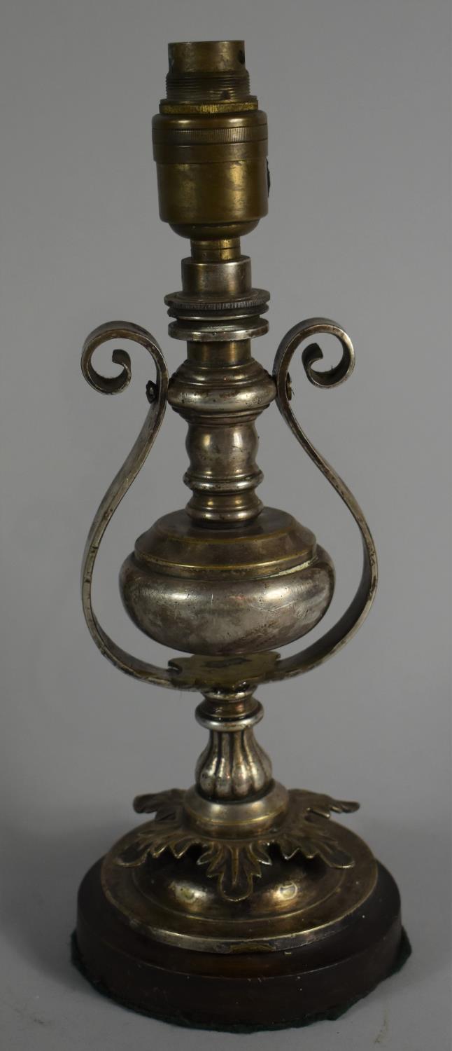 A Heavy Gimballed Ships Table Lamp, Now Converted to Electricity, 31.5cm High