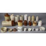 A Collection of Stoneware Bottles and Pots